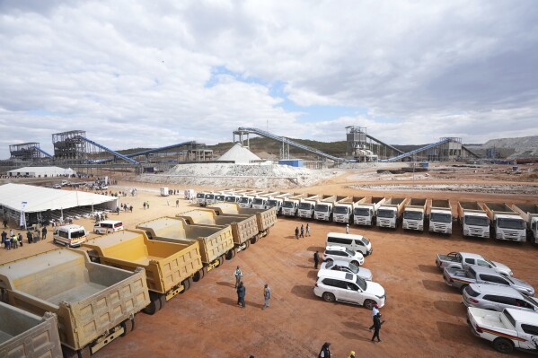 Trucks and machinery are seen on the grounds of Prospect Lithium Zimbabwe's processing plant in Goromonzi about 80 kilometers southeast of the capital Harare, Wednesday, July 5 2023. A Chinese mining company on Wednesday commissioned a $300 million lithium processing plant in Zimbabwe. Zimbabwe has one of the world’s largest reserves of the metal, which has seen a surge in demand globally due to its use in batteries in electric cars. (AP Photo/Tsvangirayi Mukwazhi)