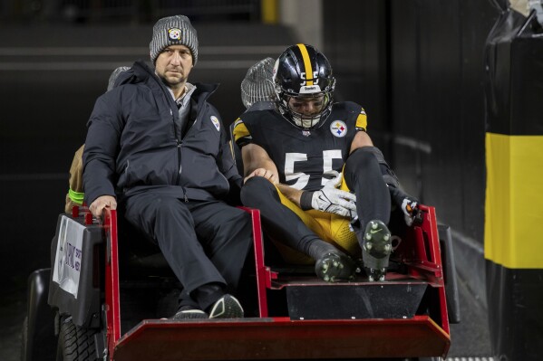 Pittsburgh Steelers linebacker Cole Holcomb (55) is carted off the field during an NFL football game, Nov. 2, 2023, in Pittsburgh. (AP Photo/Matt Durisko, file)