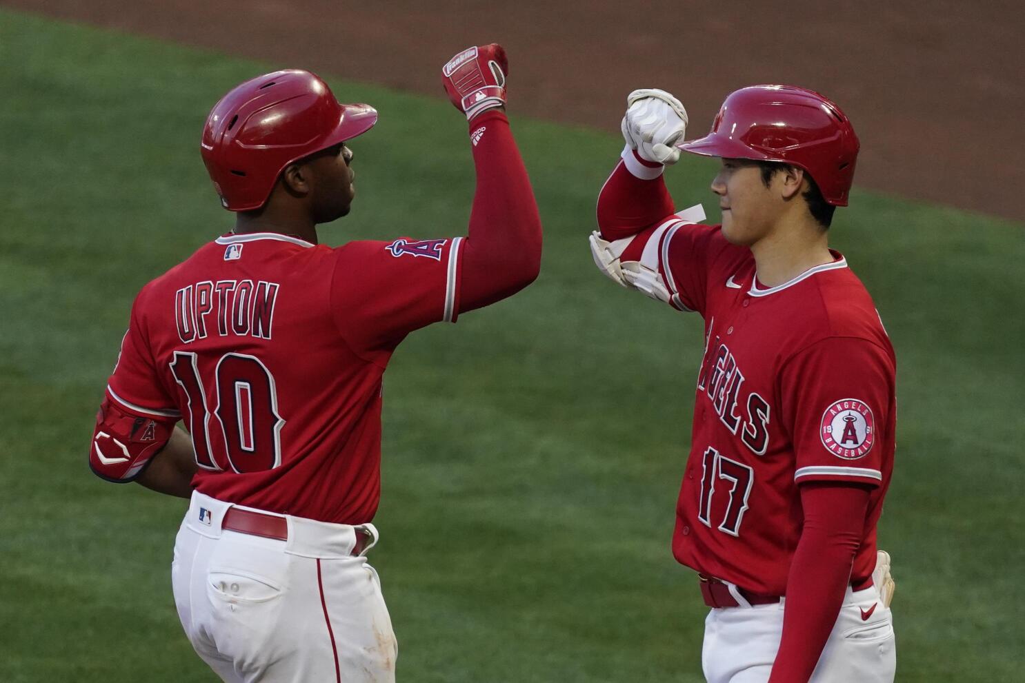 Los Angeles Angels' Shohei Ohtani (17) walks off the field after