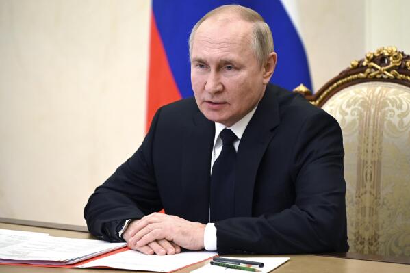 Russian President Vladimir Putin chairs a Security Council meeting via videoconference in Moscow, Russia, Wednesday, Dec. 21, 2022. (Pavel Byrkin, Sputnik, Kremlin Pool Photo via AP)