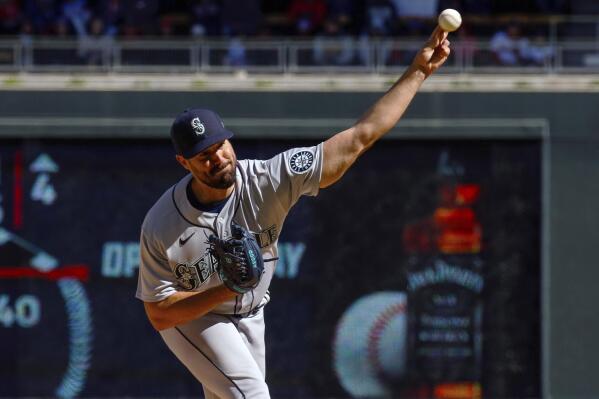 Seattle Mariners starting pitcher Robbie Ray (38) throws against the Minnesota Twins in the second inning of a baseball game, Friday, April 8, 2022, in Minneapolis. (AP Photo/Nicole Neri)