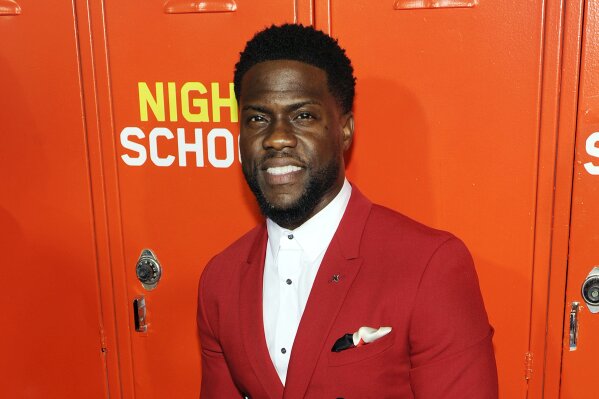 FILE - Kevin Hart, a cast member, producer and co-writer of "Night School," poses at the premiere of the film Sept. 24, 2018, in Los Angeles. Hart will debut his new SiriusXM original podcast with Jerry Seinfeld as the series' inaugural guest. The satellite radio company announced Wednesday, Jan. 27, 2021, the launch of Hart's "Inside Jokes with Kevin Hart." (Photo by Chris Pizzello/Invision/AP, File)