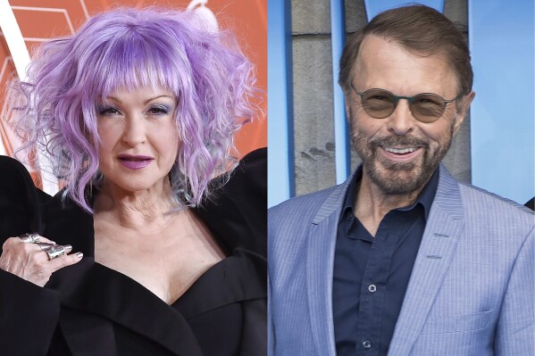Cyndi Lauper arrives at the 74th annual Tony Awards in New York on Sept. 26, 2021, left, and Bjorn Ulvaeus appears at the premiere of "Mamma Mia! Here We Go Again" in London on July 16, 2018. (APPhoto)