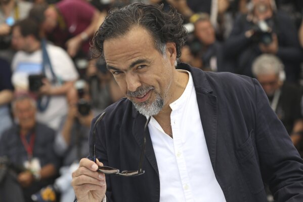 
              Jury president Alejandro Gonzalez Inarritu poses for photographers at the photo call for the jury at the 72nd international film festival, Cannes, southern France, Tuesday, May 14, 2019. (Photo by Vianney Le Caer/Invision/AP)
            
