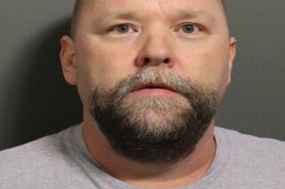 This undated photo provided by the Douglas County Sheriff's Office shows Shawn O'Brien who was charged Feb. 21, 2020 with one count of indecent liberties with a child after a girl accused him of touching her sexually seven or eight years ago under the guise of a "massage." O'Brien also allegedly told her that she shouldn't tell anyone what happened because he said massages were "really expensive" and she was "lucky" to get one for free. (Douglas County Sheriff's Office via AP)