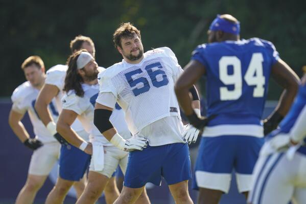 Indianapolis Colts guard Quenton Nelson (56) stretches during practice at the NFL team's football training camp in Westfield, Ind., Tuesday, Aug. 24, 2021. (AP Photo/Michael Conroy)