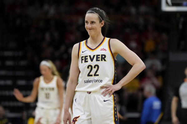 Caitlin Clark returns to Iowa in Fever's preseason game against Brazil despite leg injury | AP News