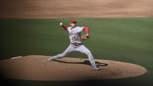 Los Angeles Angels starting pitcher Shohei Ohtani delivers during the second inning of the team's baseball game against the San Diego Padres on Tuesday, July 4, 2023, in San Diego. (AP Photo/Denis Poroy)