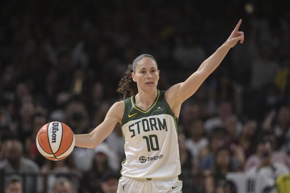 FILE - Seattle Storm guard Sue Bird (10) directs teammates during the second half of a WNBA game against the Las Vegas Aces, Sunday, Aug. 14, 2022, in Las Vegas. When opponents and teammates alike read off the skills that have separated Sue Bird into being one of the best, her mind and the way she sees the game is at the top of the list. That skill of being a coach on the court will be tested when the fourth-seeded Seattle Storm face No. 1 seed Las Vegas in the WNBA semifinals.(AP Photo/Sam Morris, File)