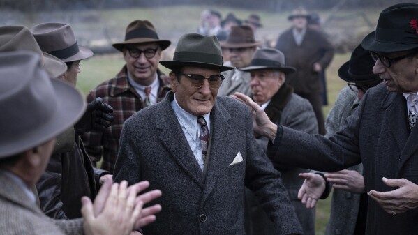 This image released by Warner Bros. Pictures shows Robert De Niro as Vito Genovese, center, in a scene from "The Alto Knights." (Warner Bros. Pictures via AP)