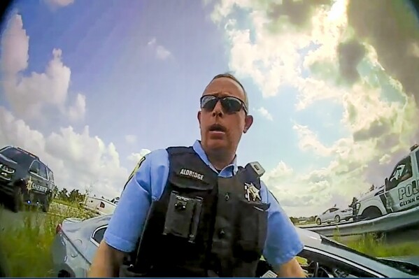 This still image from a deputy鈥檚 body camera video provided by the Camden County Sheriff's Office shows Staff Sgt. Buck Aldridge following a chase and arrest on June 24, 2022. Aldridge was placed on administrative pending an investigation after he fatally shot Leonard Cure on Oct. 16, 2023, in Camden County, Georgia. The deputy shot the Black man at point-blank range during a traffic stop after the man, who had been wrongfully imprisoned years ago, grabbed the officer by the neck and was forcing his head backward, according to video released by a sheriff. (Camden County Sheriff's Office via AP)