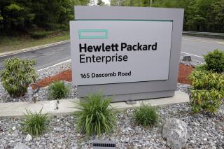 FILE - A sign marks the entry way into Hewlett Packard Enterprise Tuesday, May 24, 2016, in Andover, Mass.  Tech giant Hewlett Packard Enterprise has won a multibillion-dollar lawsuit, Friday, Jan. 28, 2022, against a British businessmen it accused of fraud after purchasing his software company Autonomy a decade ago. (AP Photo/Elise Amendola)