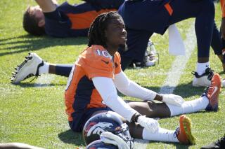 Denver Broncos wide receiver Jerry Jeudy takes part in a drill during NFL football practice at the team's headquarters Tuesday, June 1, 2021, in Englewood, Colo. (AP Photo/David Zalubowski)