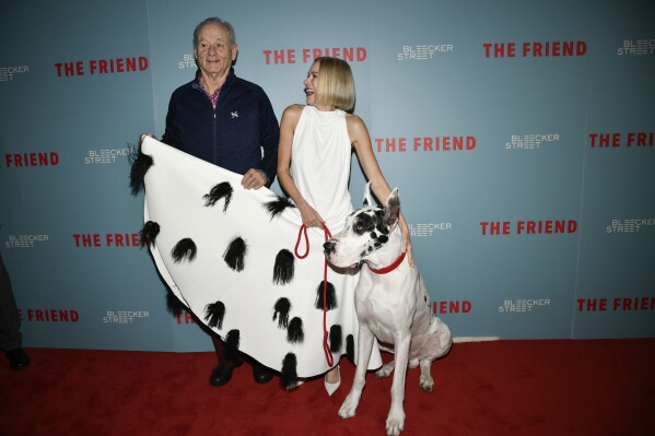 Bill Murray, from left, Naomi Watts, and Bing the Great Dane attend the premiere of "The Friend" at IPIC Theaters on Monday, March 24, 2025, in New York. (Photo by Evan Agostini/Invision/AP)