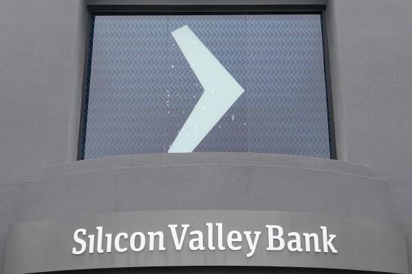 A Silicon Valley Bank sign is shown at the company's headquarters in Santa Clara, Calif., Friday, March 10, 2023. The Federal Deposit Insurance Corporation is seizing the assets of Silicon Valley Bank, marking the largest bank failure since Washington Mutual during the height of the 2008 financial crisis. The FDIC ordered the closure of Silicon Valley Bank and immediately took position of all deposits at the bank Friday. (AP Photo/Jeff Chiu)
