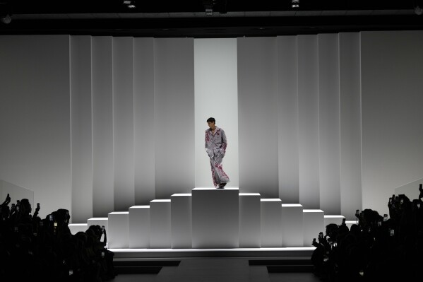 A model wears a creation as part of the men's Dolce & Gabbana Spring-Summer 2026 collection, that was presented in Milan, Italy, Saturday, June 21, 2025. (AP Photo/Luca Bruno)
