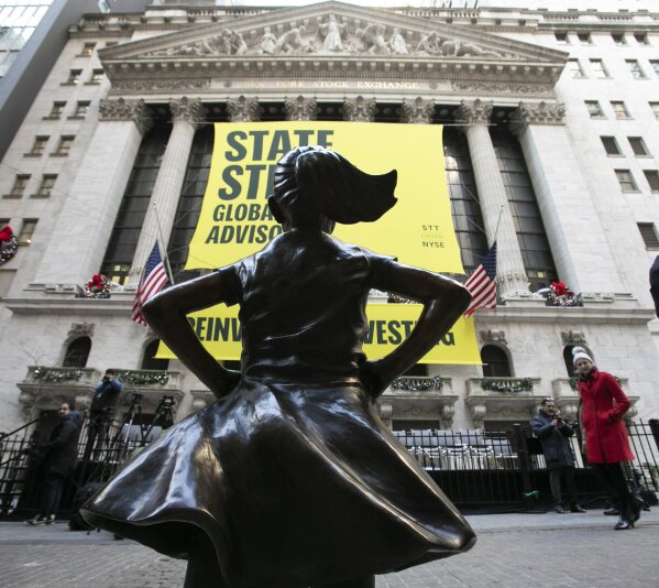 
              The Fearless Girl statue is unveiled at its new location in front of the New York Stock Exchange, Monday, Dec. 10, 2018, in New York. The statue, considered by many to symbolize female empowerment, was previously located near the Charging Bull statue on lower Broadway. (AP Photo/Mark Lennihan)
            