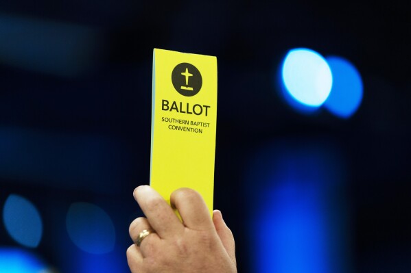 FILE - An Attendee holds up a ballot during the Southern Baptist Convention's annual meeting in Anaheim, Calif., Tuesday, June 14, 2022. Thousands will gather in Indianapolis, June 11-12, 2024, for the annual meeting of the Southern Baptist Convention. (AP Photo/Jae C. Hong, File)
