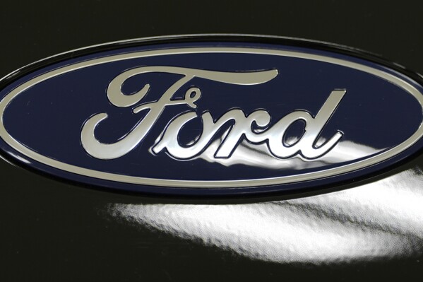A Ford logo is seen on a 2025 Ford Expedition during a media tour at the Ford Motor Company Kentucky Truck Plant, Wednesday, April 30, 2025, in Louisville, Ky. (AP Photo/Carolyn Kaster)