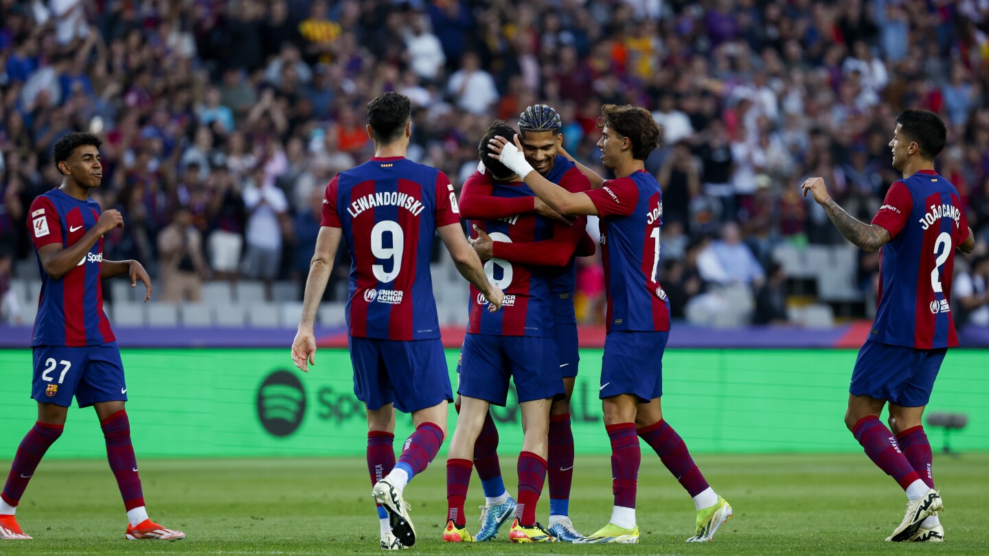 МАДРИД (AP) — Барселона победи Райо Валекано с 3-0, за