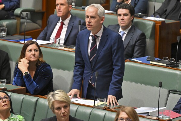 Minister for Immigration Andrew Giles during Question Time in the House of Representatives at Parliament House in Canberra on Sept. 12, 2023. Australia's immigration minister said Monday, Nov. 13, 2023, that 80 people including convicted criminals who are considered dangerous have been released from Australian migrant detention centers since the High Court ruled last week that their indefinite detention was unconstitutional. (Mick Tsikas/AAP Image via AP)