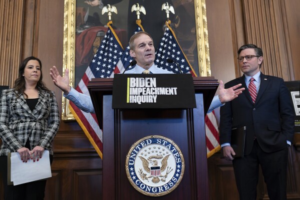 House Judiciary Committee Chairman Jim Jordan, R-Ohio, center, flanked by Republican Conference Chair Elise Stefanik, R-N.Y., and Speaker of the House Mike Johnson, R-La., talks with reporters about efforts to investigate President Joe Biden and his son Hunter Biden, at the Capitol in Washington, Wednesday, Nov. 29, 2023. (AP Photo/J. Scott Applewhite)