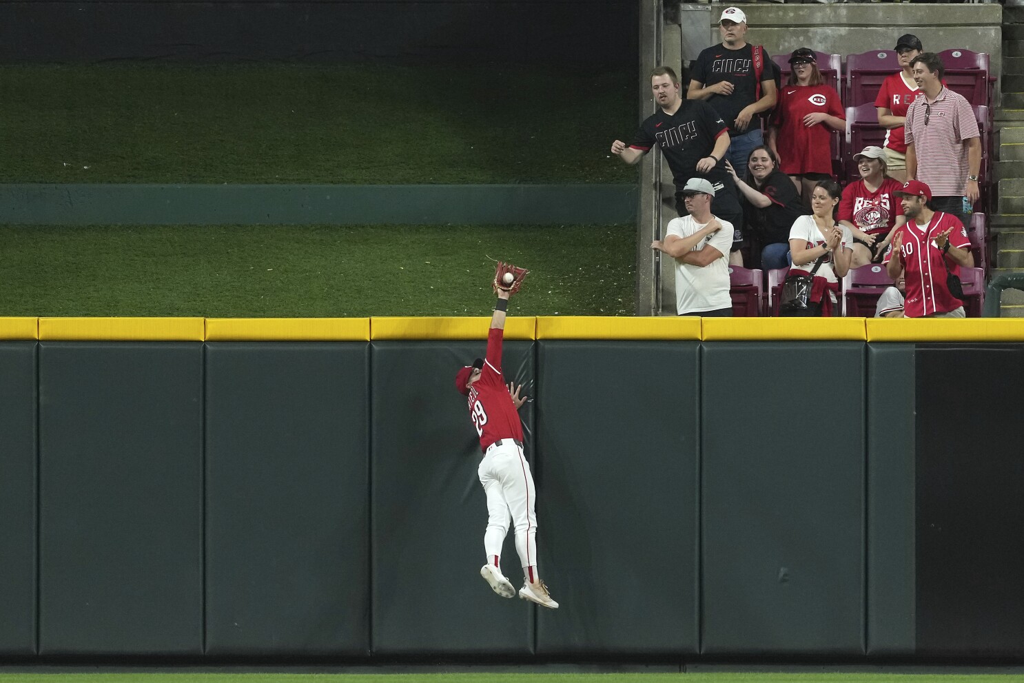 Friedl makes game-saving grab and Reds rally to snap Brewers' 8-game streak with 4-2 win