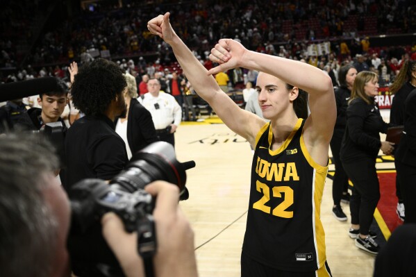 Iowa guard Caitlin Clark (22) reacts after an NCAA college basketball game against Maryland, Saturday, Feb. 3, 2024, in College Park, Md. (AP Photo/Nick Wass)