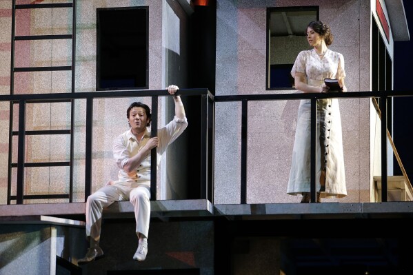 Arturo Chacon-Cruz as Arcadio, left, and Lisette Oropesa as Rosalba perform during a rehearsal for the Spanish-language opera, "Florencia en el Amazonas," at the Dorothy Chandler Pavilion, in Los Angeles, Monday, Nov. 17, 2014. (AP Photo/Jae C. Hong, file)