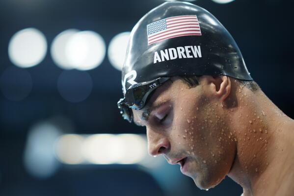 Michael Andrew, of United States, comes off the pool after swimming in the men's 200-meter individual medley final at the 2020 Summer Olympics, Friday, July 30, 2021, in Tokyo, Japan. (AP Photo/David Goldman)
