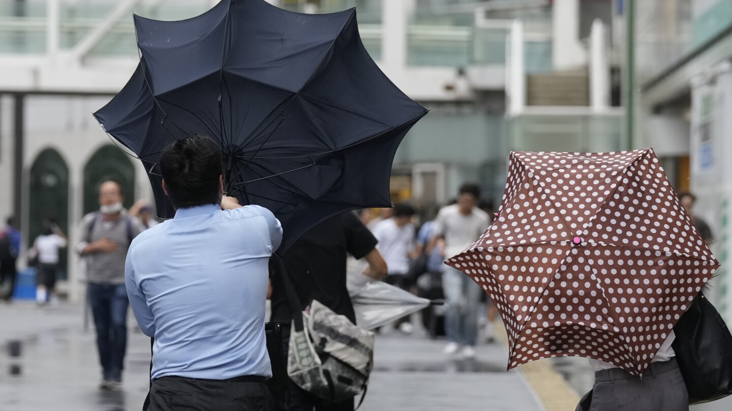 Evacuation ordered in northern Japan, power out, flights, trains canceled as a typhoon approaches