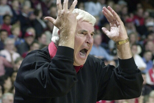 FILE - Texas Tech coach Bob Knight yells from the sideline during the first half of the team's NCAA college basketball game against Houston on Dec. 14, 2001, in Houston. Knight, the brilliant and combustible coach who won three NCAA titles at Indiana and for years was the scowling face of college basketball, has died. He was 83. Knight's family made the announcement on social media on Wednesday night, Nov. 1, 2023, saying he was surrounded by family members at his home in Bloomington, Ind. (AP Photo/Pat Sullivan, File)