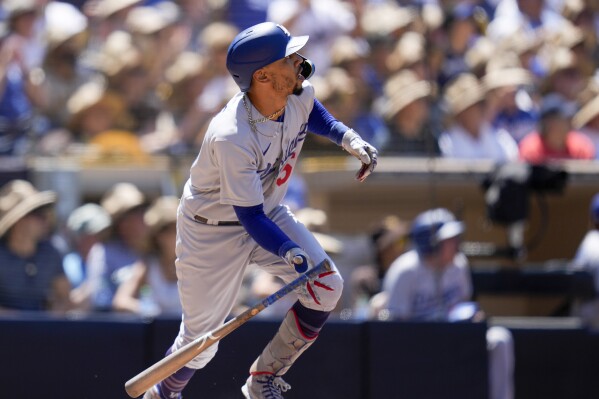 Betts' grand slam caps 8-run 4th inning as the Dodgers stun the