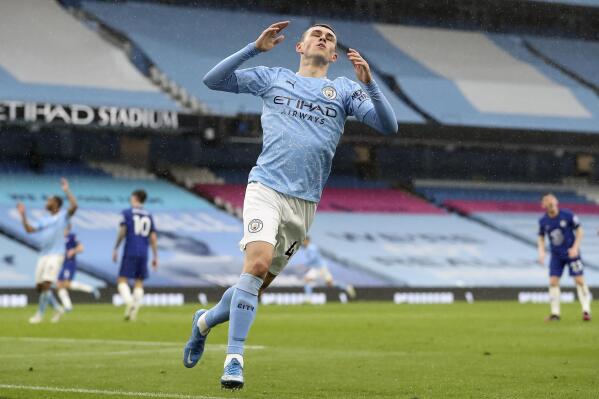Manchester City's Phil Foden reacts after a missed chance during the English Premier League soccer match between Manchester City and Chelsea at the Etihad Stadium in Manchester, Saturday, May 8, 2021.(Martin Rickett/Pool via AP)