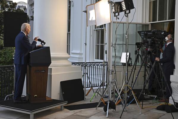 President Joe Biden speaks from the Blue Room Balcony of the White House Monday, Aug. 1, 2022, in Washington, as he announces that a U.S. airstrike killed al-Qaida leader Ayman al-Zawahri in Afghanistan. (Jim Watson/Pool via AP)
