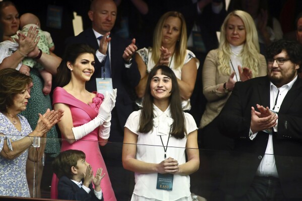Chloe Cole, center, is recognized by Florida Gov. Ron DeSantis during a joint session for his State of the State speech at the Capitol in Tallahassee, Fla., March 7, 2023. Cole received puberty blockers when she was 13, and underwent a double mastectomy at 15. Now she is an advocate against allowing those procedures on children. (AP Photo/Phil Sears, File)