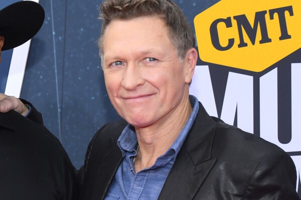 FILE - Craig Morgan arrive at the CMT Music Awards in Nashville, Tenn., on April 11, 2022. Morgan's six-track EP, titled “Enlisted,” is out Friday. (AP Photo/John Amis, File)