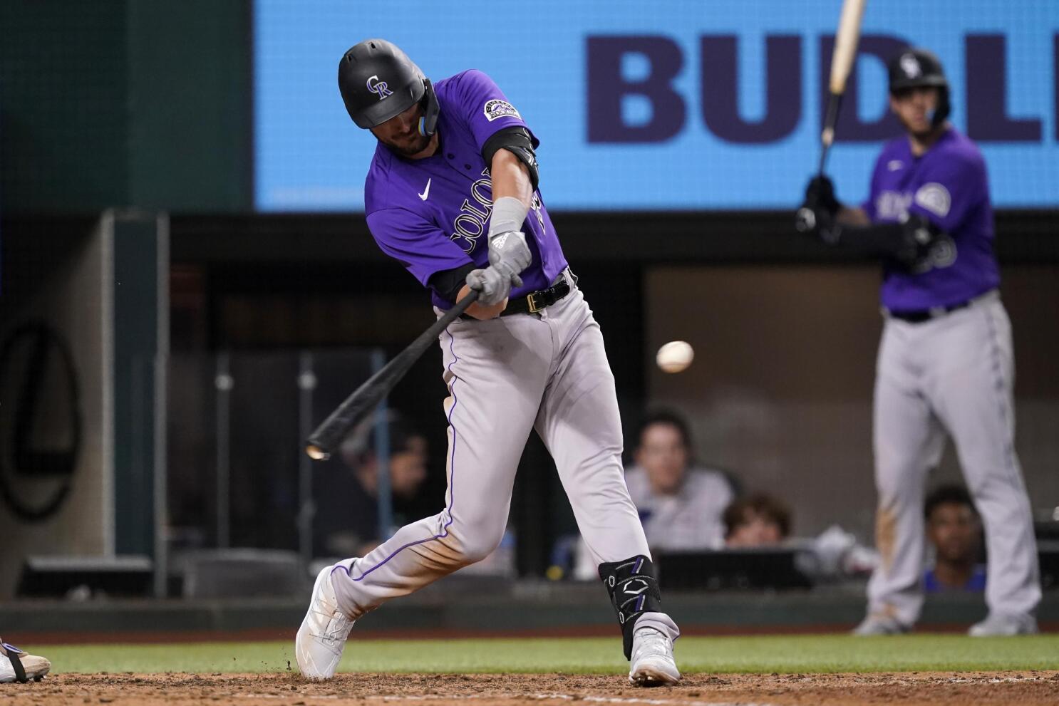 Charlie Blackmon exits with right calf injury