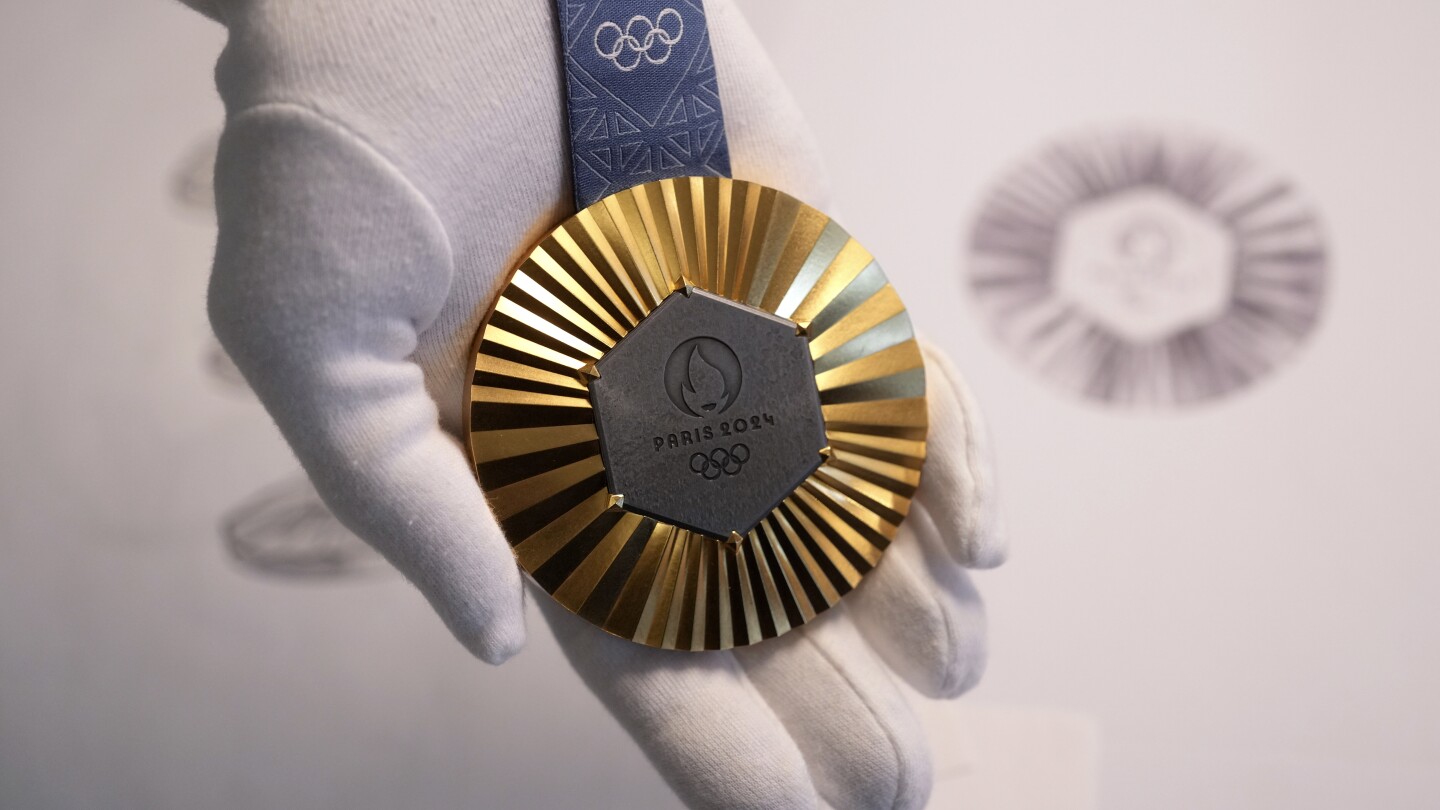 The Paris Olympics medals are embedded with pieces of the Eiffel Tower