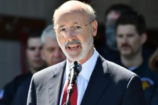 FILE - In this May 12, 2021 file photo, Gov. Tom Wolf speaks at an event in Mechanicsburg, Pa. Beyond the local races on ballots, Pennsylvania’s primary election will determine the future of a governor’s authority during disaster declarations. Voters statewide Tuesday, May 18 will decide four separate ballot questions, including two on whether to give state lawmakers much more power over disaster declarations. (AP Photo/Marc Levy)