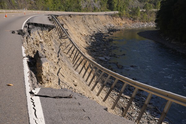 Damage from Hurricane Helene flooding is seen along eastbound lanes of Interstate 40 near the North Carolina state line, Oct. 7, 2024, in Cocke County, Tenn. (AP Photo/George Walker IV, File)