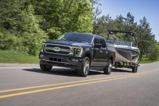 This photo provided by Ford Motor Co. shows the 2021 Ford F-150, which is the Edmunds Top Rated full-size pickup truck. With several available powertrains and body configurations, the F-150 has many different towing capacities, but that number is affected by axle ratio as well. (Courtesy of Ford Motor Co. via AP).