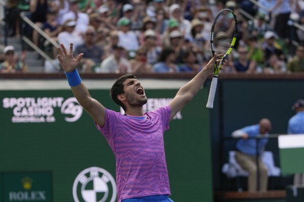 Carlos Alcaraz, of Spain, celebrates after defeating Daniil Medvedev, of Russia, in the final match at the BNP Paribas Open tennis tournament, Sunday, March 17, 2024, in Indian Wells, Calif. (AP Photo/Ryan Sun)