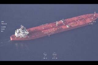 FILE - This frame grab from a video released by Iran's paramilitary Revolutionary Guard on Wednesday, Nov. 3, 2021, shows the seized Vietnamese-flagged oil tanker in the Gulf of Oman. Satellite tracking data and other signals on Wednesday, Nov. 10, 2021 suggested the Vietnamese oil tanker earlier seized by Iran had been freed by the Islamic Republic. (Revolutionary Guard via AP, File)
