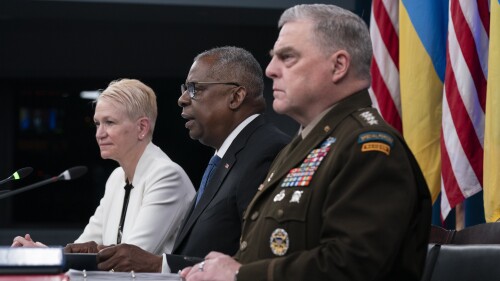 Secretary of Defense Lloyd Austin, center, with Chairman of the Joint Chiefs Gen. Mark Milley, right, and Assistant Secretary of Defense for International Security Affairs Celeste Wallander, left, speaks during a virtual meeting of the Ukraine Defense Contact Group at the Pentagon in Washington, Tuesday, July 18, 2023. (AP Photo/Manuel Balce Ceneta)