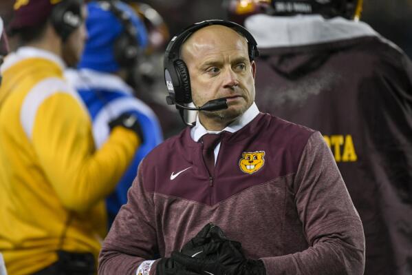 FILE - Minnesota head coach P.J. Fleck waits as referees review a play during an NCAA college football game against Iowa in the second half Saturday, Nov. 19, 2022, in Minneapolis. Minnesota plays Syracuse in the Pinstripe Bowl on Thursday, Dec. 29. (AP Photo/Craig Lassig, File)