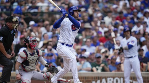 Chicago Cubs' Cody Bellinger hits a grand slam during the third inning of a baseball game against the Boston Red Sox Saturday, July 15, 2023, in Chicago. (AP Photo/Erin Hooley)
