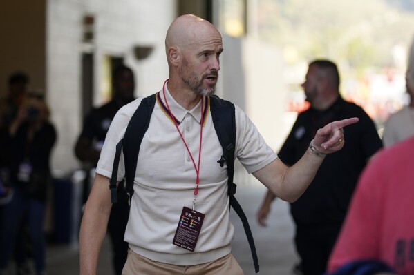 Manchester United manager Erik ten Hag arrives for the team's club friendly soccer match against Wrexham on Tuesday, July 25, 2023, in San Diego. (AP Photo/Gregory Bull)