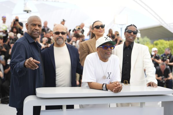 Washington, from left, Jeffrey Wright, Ilfenesh Hadera, Lee and A$AP Rocky at the "Highest 2 Lowest" photocall in Cannes. (Photo by Lewis Joly/Invision/AP)