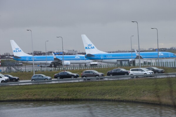 FILE - KLM airplanes sit in Schiphol Airport near Amsterdam, Netherlands, on Jan. 18, 2018. The Dutch government has systematically put the interests of the aviation sector above those of people who live near Schiphol Airport, one of Europe's busiest aviation hubs, a Dutch court ruled Wednesday, saying that the treatment of local residents amounts to a breach of Europe's human rights convention. (AP Photo/Peter Dejong, File)